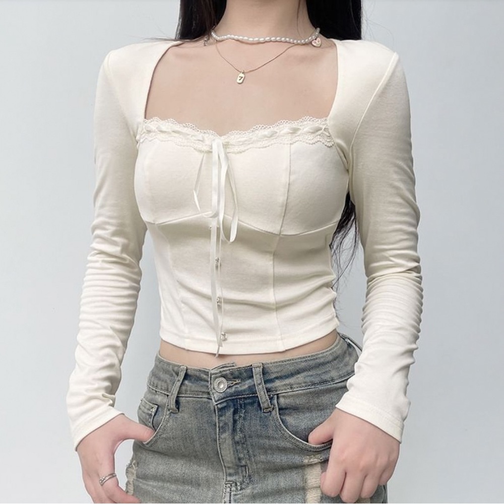 small cream/light yellow dainty long sleeve crop top from yesstyle